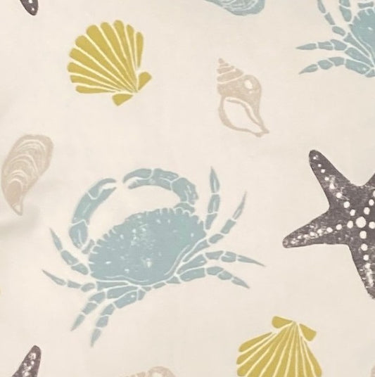 just cushions close up of offshire cushion Seashell and crab pattern on a beige background