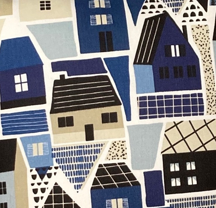 just cushions close up of clovelly cushion  houses in blue, beige, and black on a white background