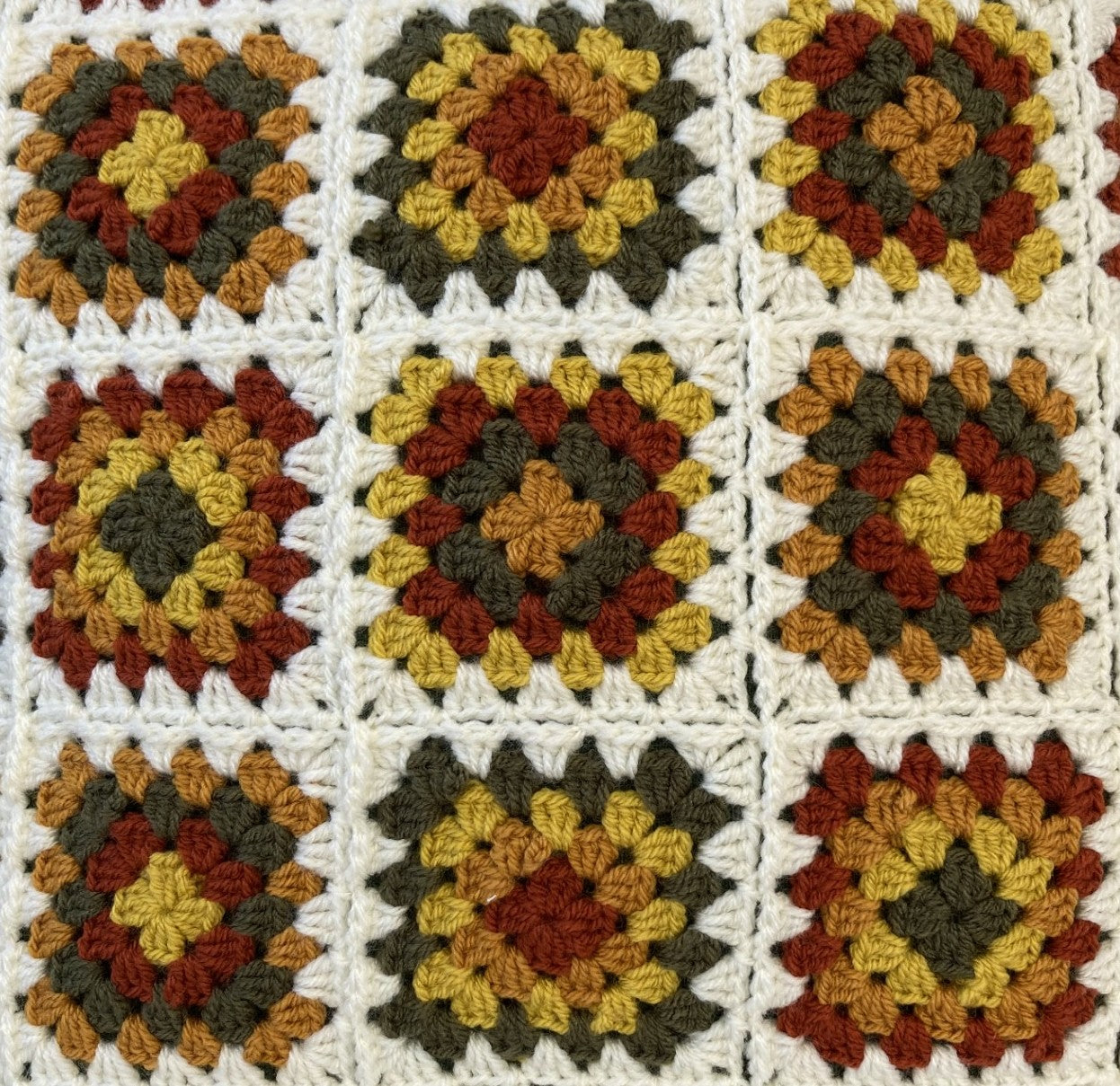 just cushions granny squares crochet cushion autumn colours close up