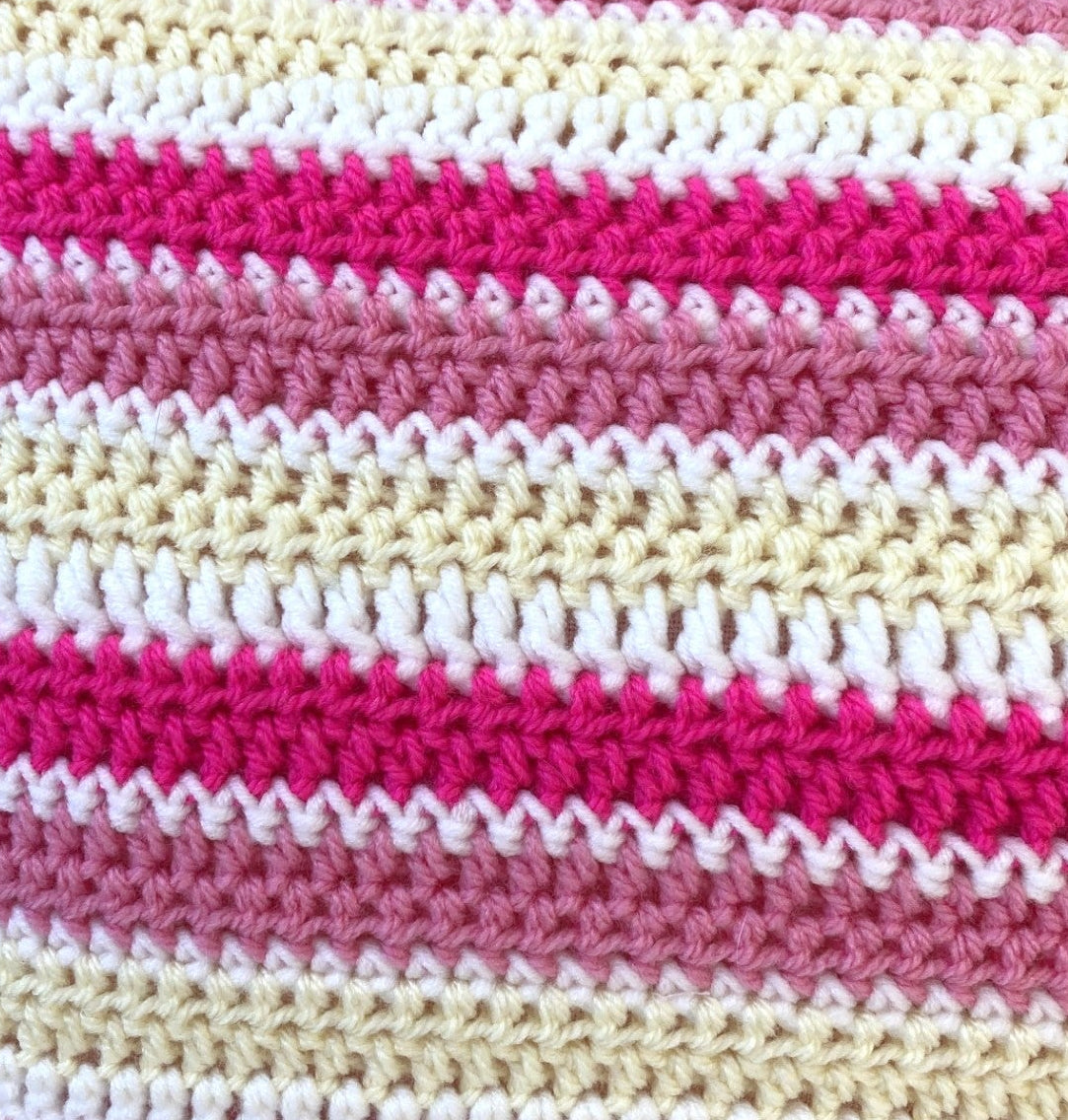 just cushions crochet cushions with pink cream and white stripes close up