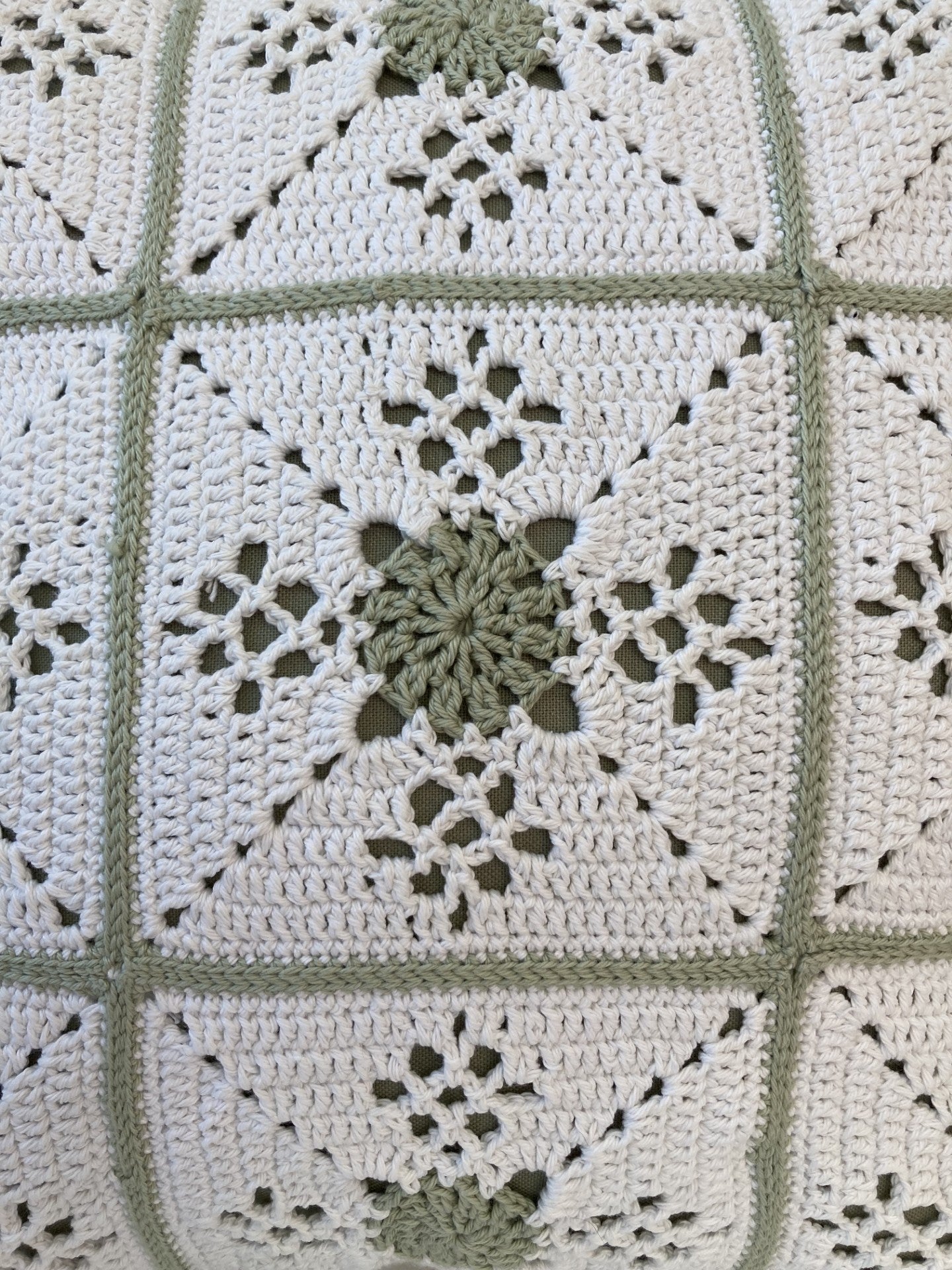 just cushons victorian lattice crochet cushion in green and white close up