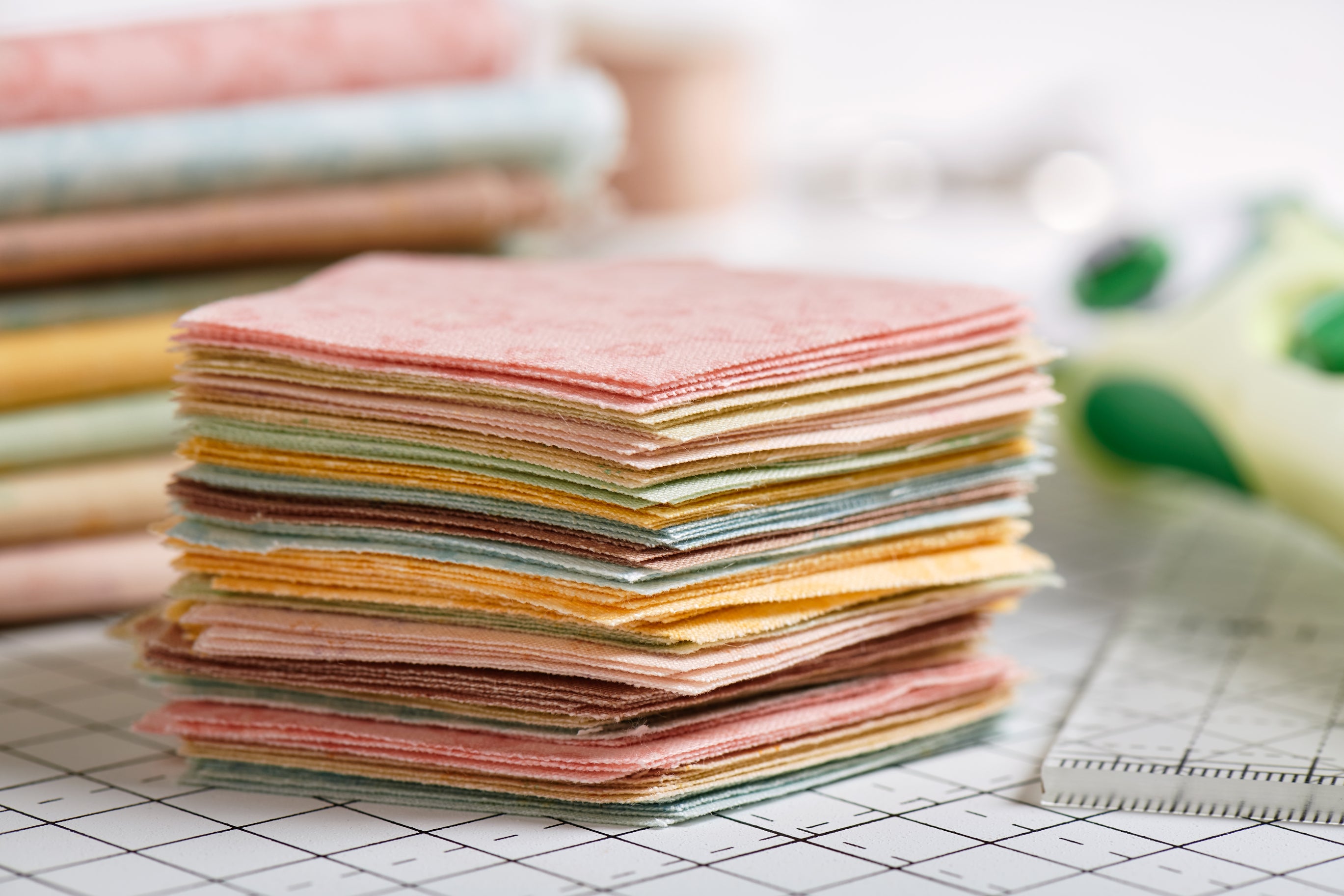 stack of pastel coloured fabric sample