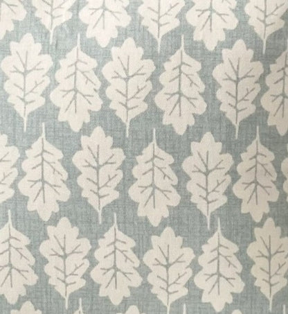 just cushions close up of fabric sample for duck egg bue oak leaf print cushion