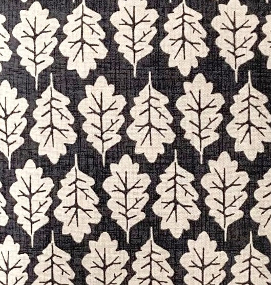 just cushions close upof fabric sample for black oak leaf print cushion