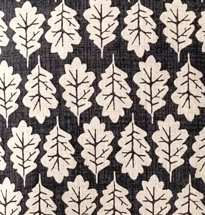 just cushions close upof fabric sample for black oak leaf print cushion