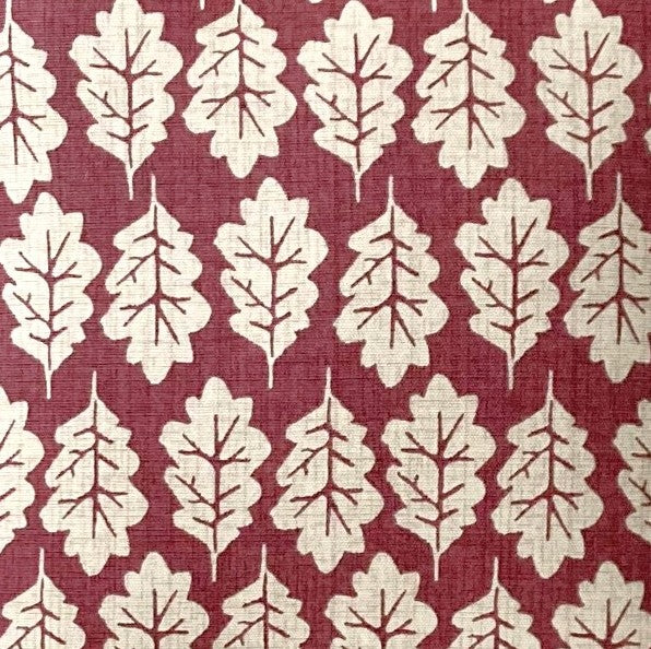 just cushions close up of fabric sample for red oak leaf pattern cushion