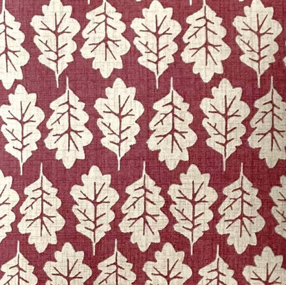 just cushions close up of fabric sample for red oak leaf pattern cushion