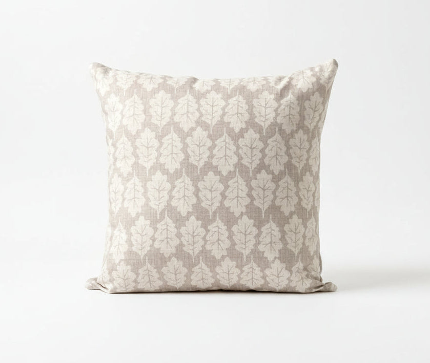 just cushions square cushion with a beige oak leaf print on an oatmeal background 