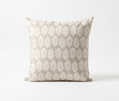just cushions square cushion with a beige oak leaf print on an oatmeal background 