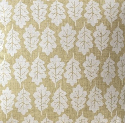 just cushions closeup of fabric sample for oak leaf ochre yellow print cushions