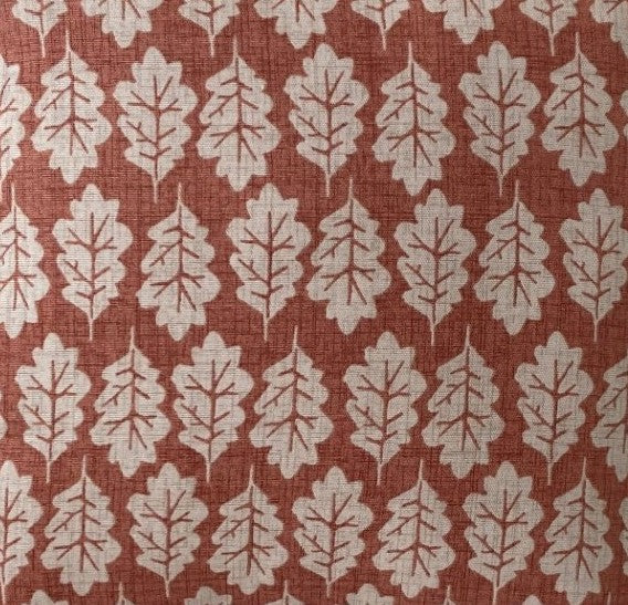 just cushions closeup of fabric sample for oak leaf paprika coloured print cushions
