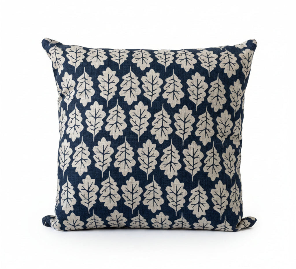just cushions square oak leaf design cushion beige leaves on a navy blue  background 