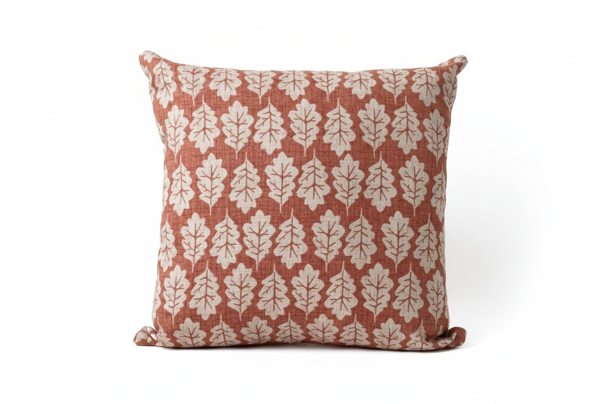 just cushions square oak leaf design cushion beige leaves on an orange background 